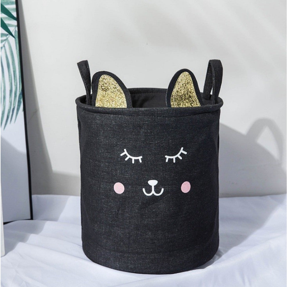 Schwarzer Aufbewahrungsbehälter mit Katzen-Gesicht und glitzernden Ohren auf hellem Hintergrund.