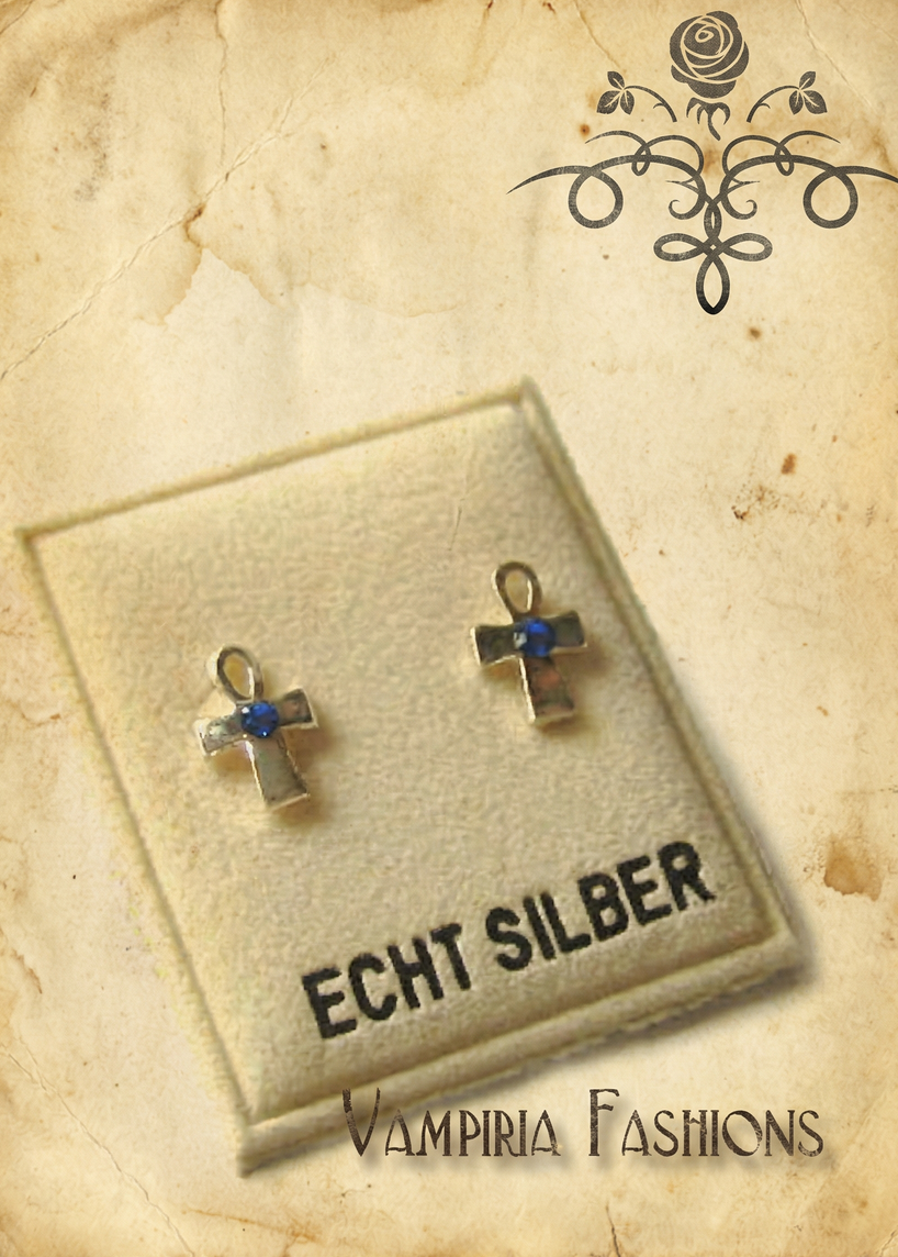 Zwei Mini-Ohrstecker in Form eines Ankh-Kreuzes mit blauem Stein auf Karte mit Aufschrift „ECHT SILBER“